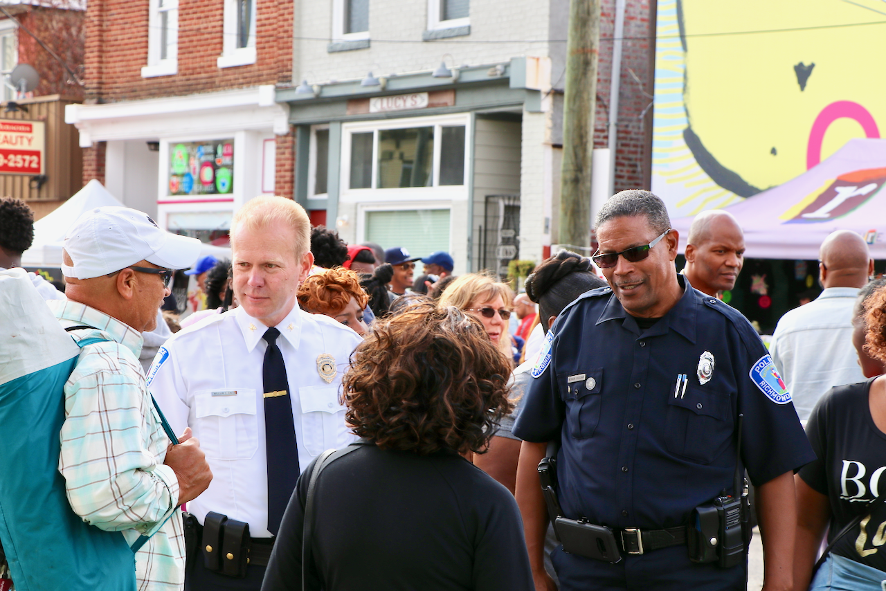 Richmond's new Police Chief William Smith and Officer Vaughan chat with festival goers as they strolled along 2nd Street
